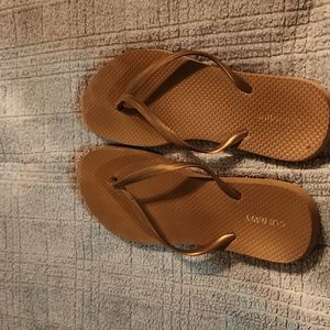 Gold flip flops